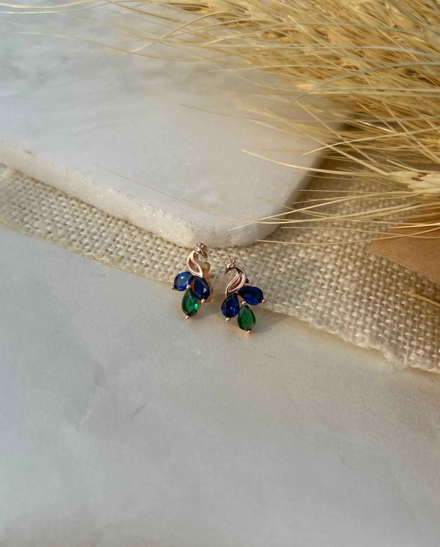 Sparkling rose gold heart studs