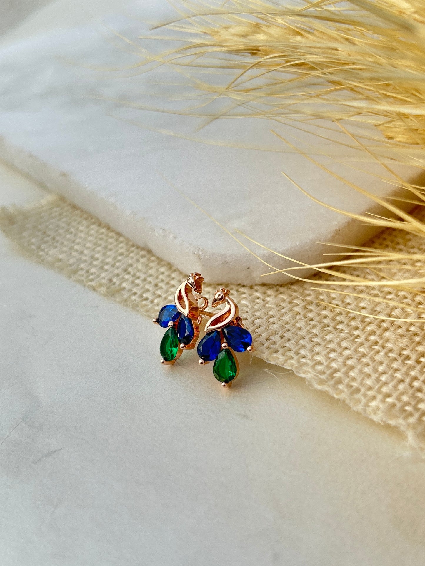 Sparkling rose gold heart studs