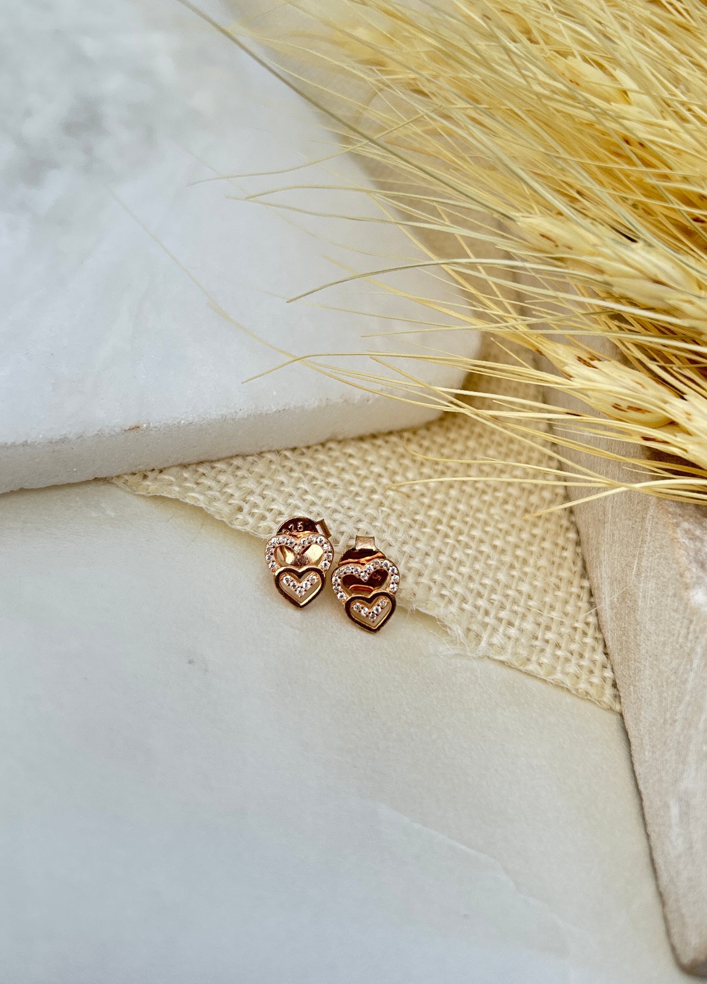 Double heart studs